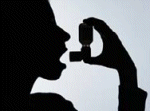 Image: Silhouette of person using asthma inhaler.