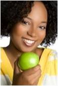 Image: Girl holding apple