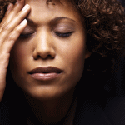 Photo: woman with stress headache