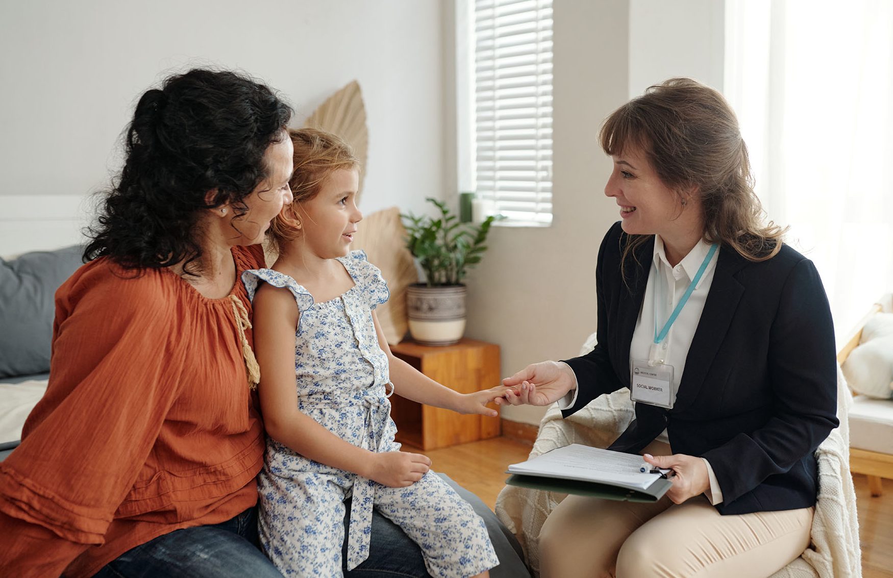 Social Worker Visiting a Family At Home
