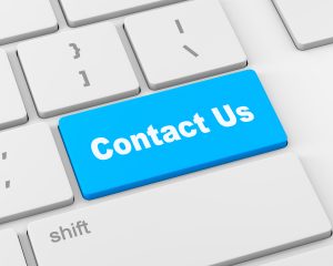 A 'contact us' message on keyboard, internet or online contact through website, 3d rendering